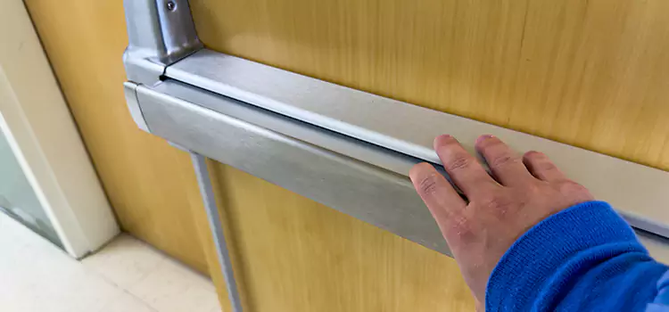 Installing a Push Bar on a Door Papillion